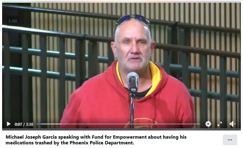 Video thumbnail - white man in red hoodie - caption: Michael Joseph Garcia speaking with Fund for Empowerment about having his medications trashed by the Phoenix Police Department