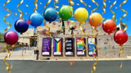 Photo of front of UUCP building overlaid with golden streamers and a rainbow of colored baloons